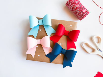 Paper Gift Bows, Set of 12 in Red, Pink, Navy, and Light Blue